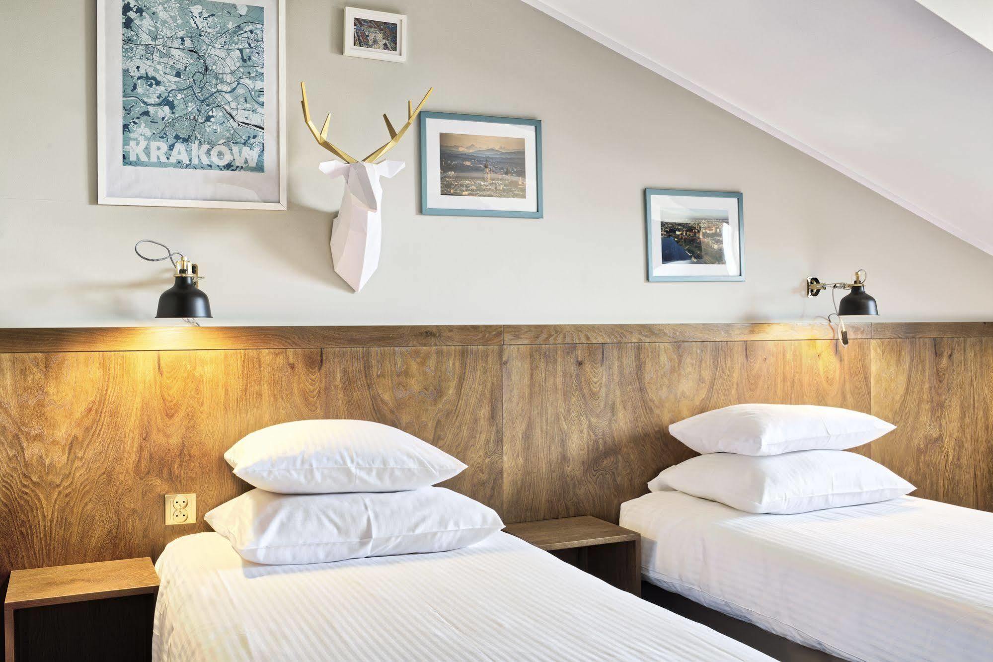 Daniel Griffin Aparthotel By Artery Hotels Krakow Bagian luar foto